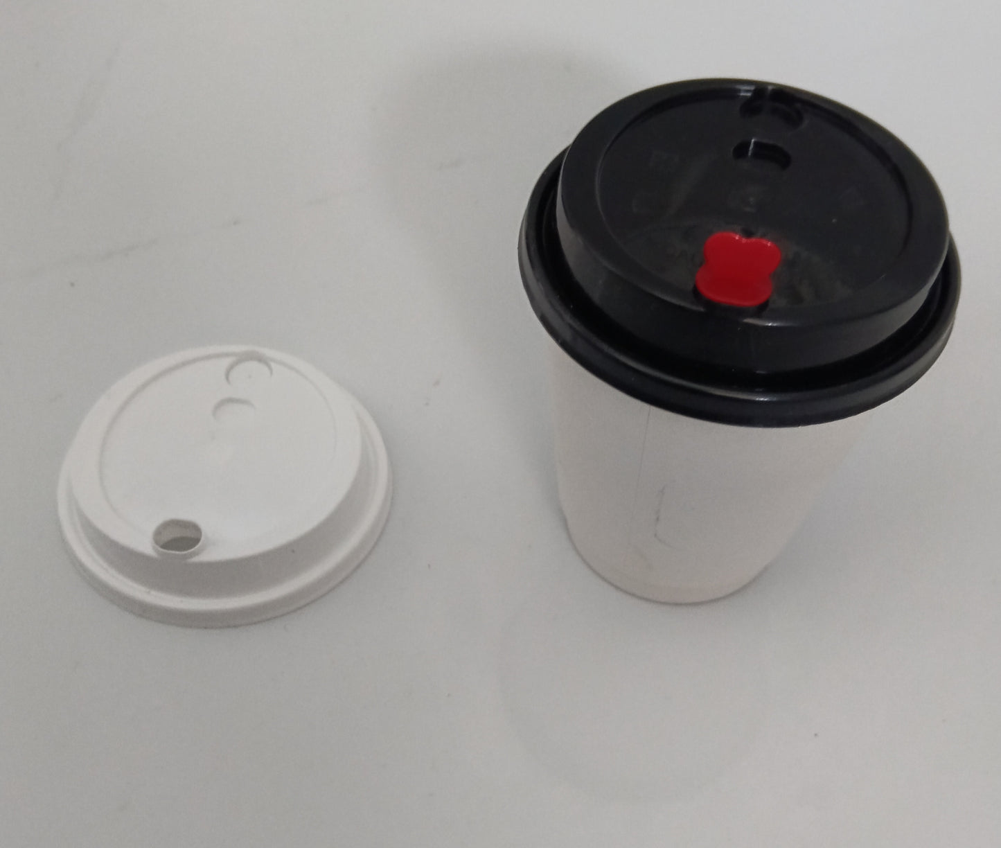 Kaffee To-Go Deckel schwarz, 1000 Stk. 23€ inkl MwSt. zzgl Versand